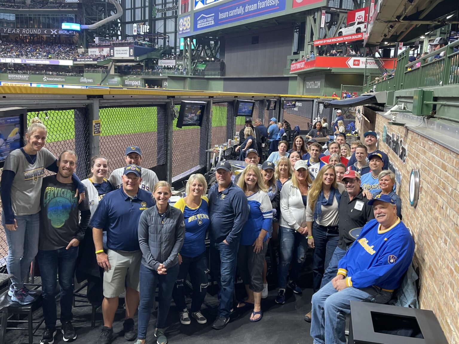 Capitol Bank employees attending a Brewers game